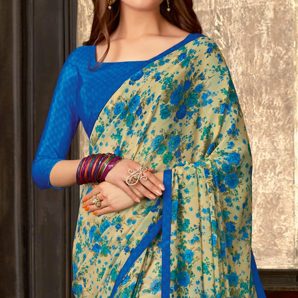 Blooming Beige-Blue Colored Casual Wear Floral Printed Georgette Saree